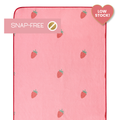 pink yoga mat towel with strawberries and labels that say "snap-free" and "low stock"