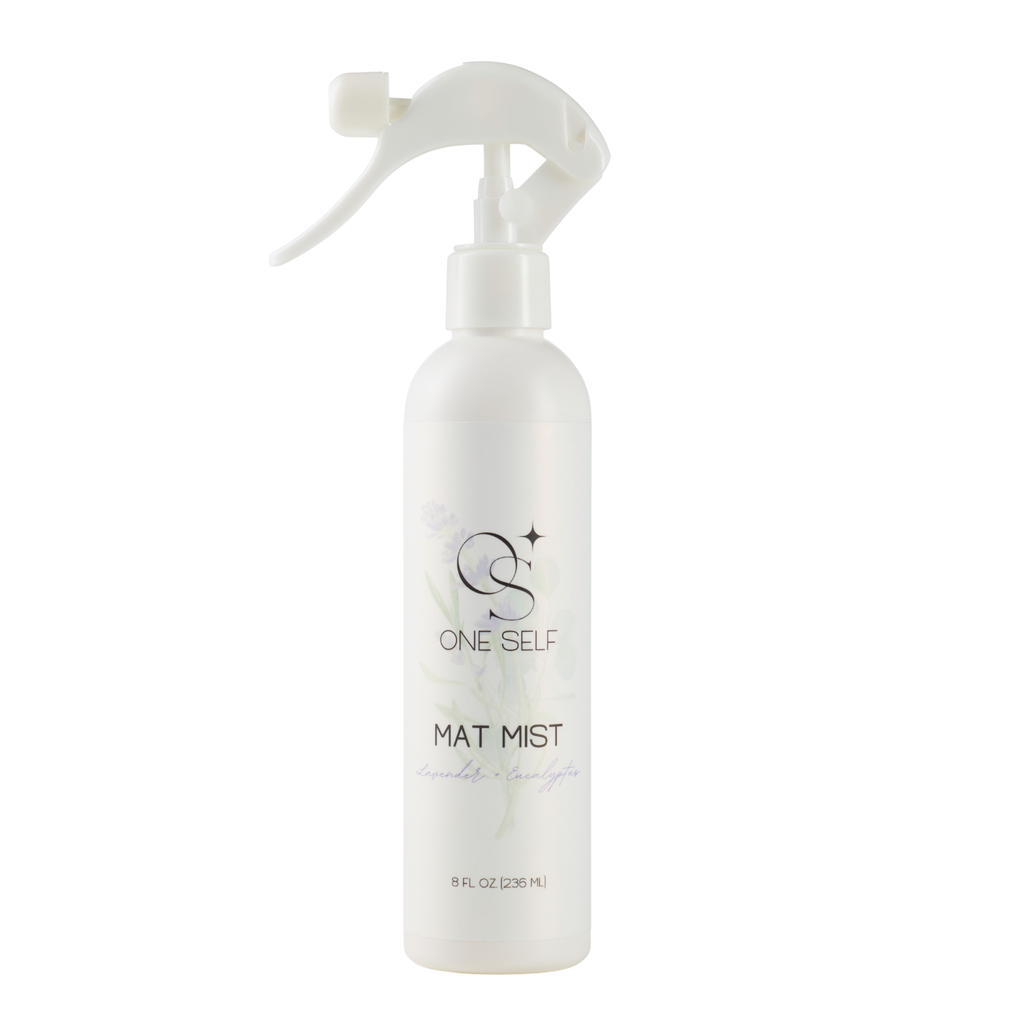 White spray bottle labeled 'ONE SELF' on a white background