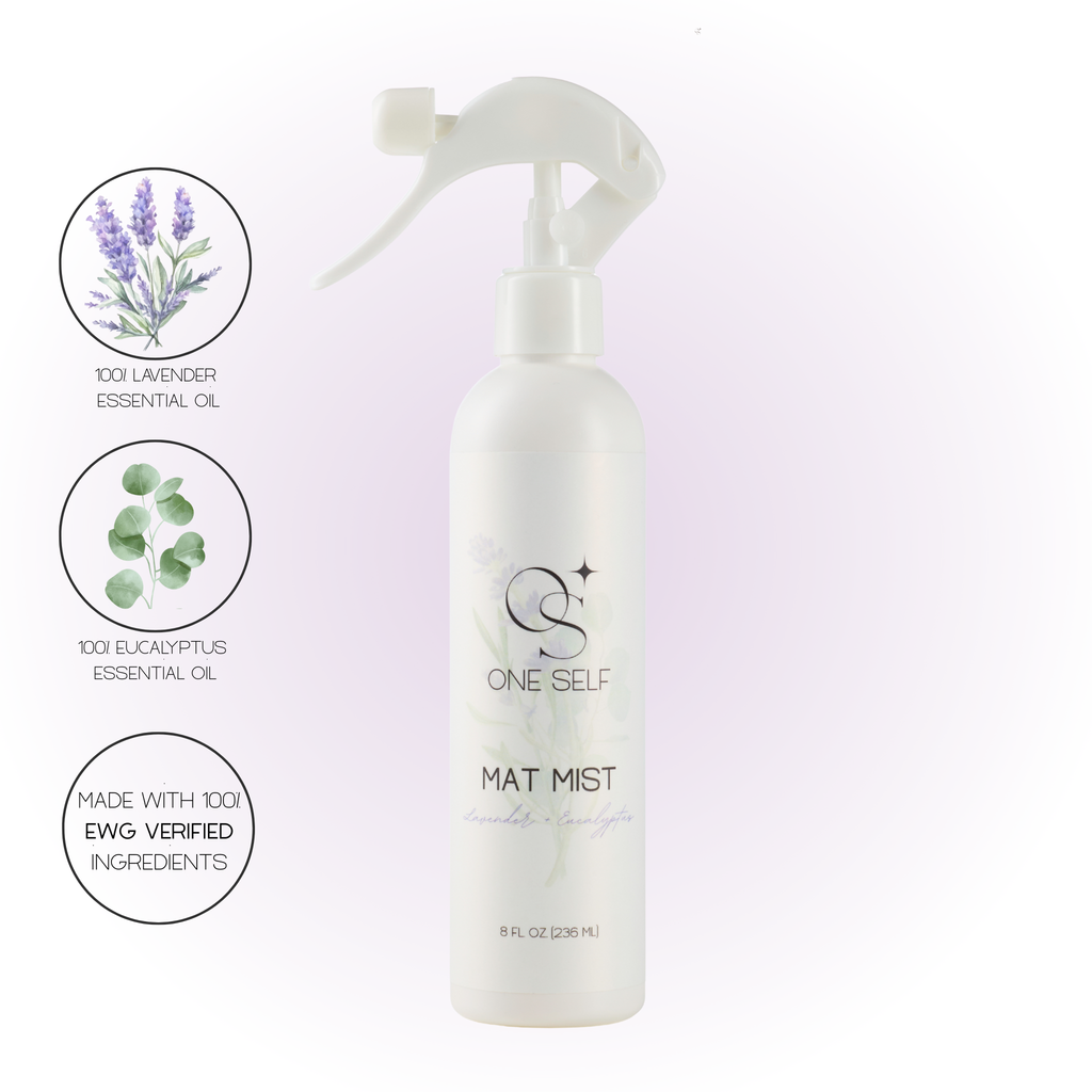 White spray bottle labeled 'ONE SELF' with lavender and eucalyptus icons on a light purple background