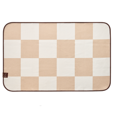Checkered hand towel with beige and white squares on a white background