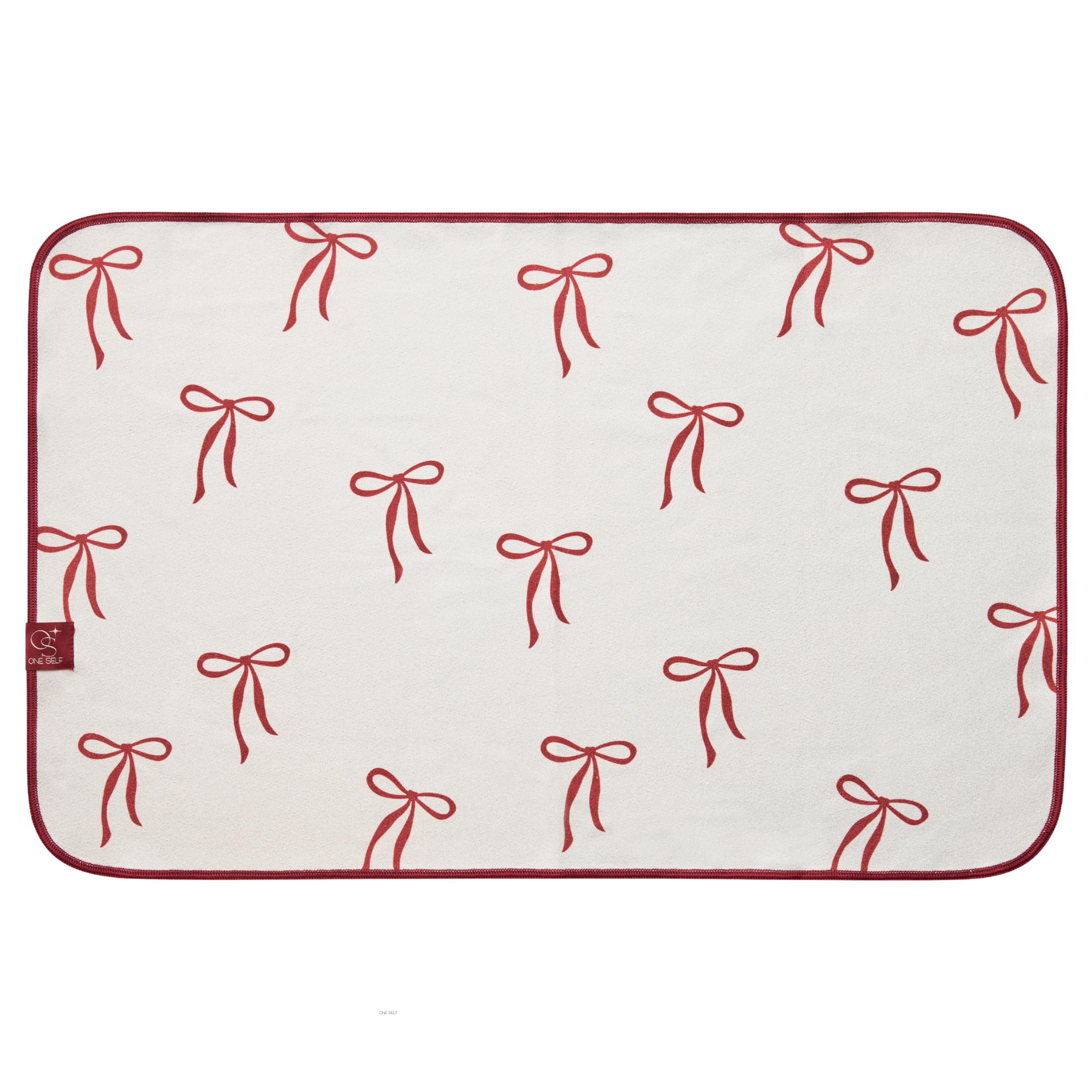 White hand towel with red bow pattern on a white background