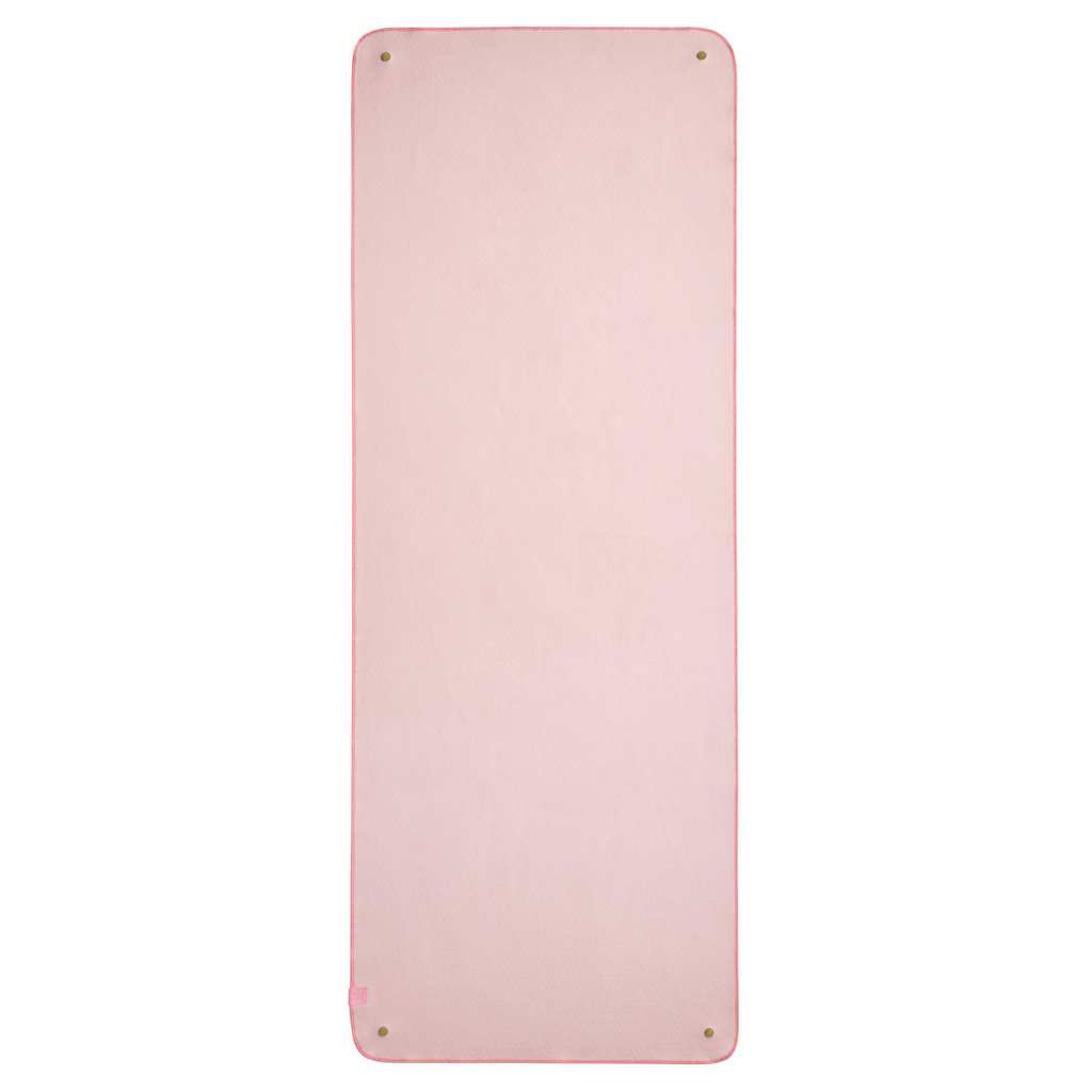 Pink yoga mat towel on a white background