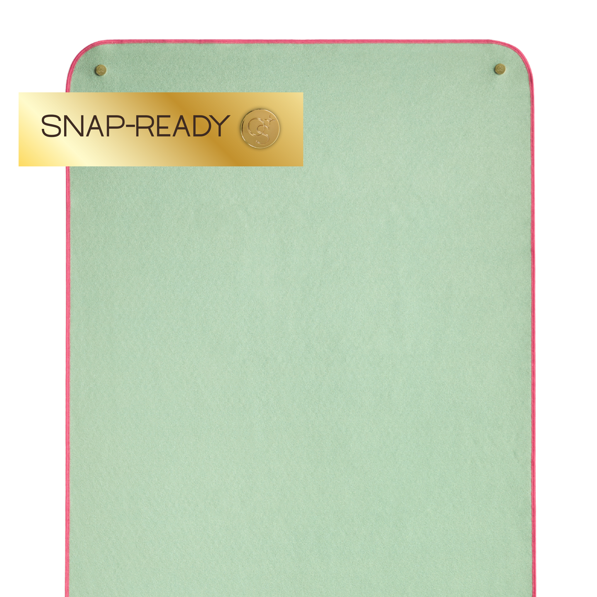 Green yoga towel with a gold 'SNAP-READY' label on a white background