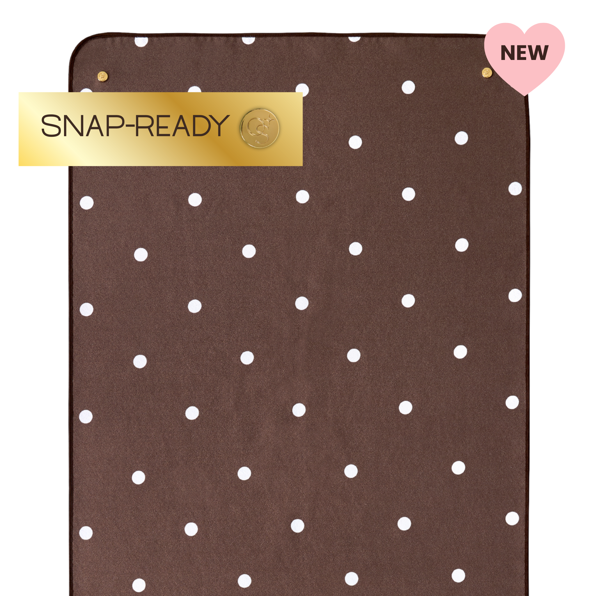brown yoga mat towel with polka dots and label that says "snap-ready" and "new"