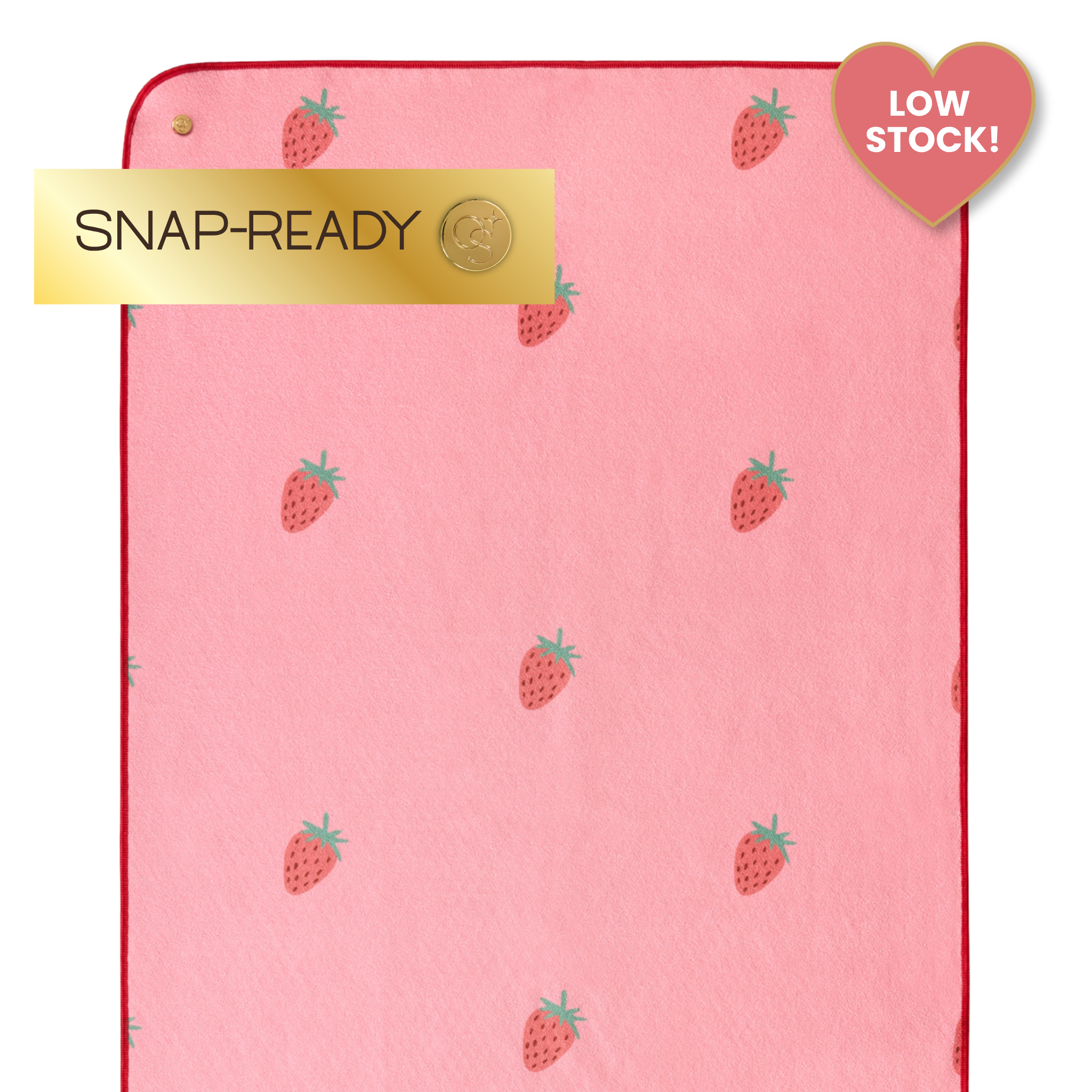 pink yoga mat towel with strawberries and labels that say "snap-ready" and "low stock"