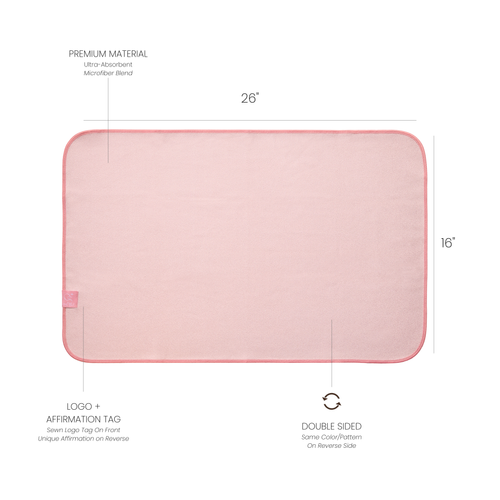 pink hand towel with dimensions labelled